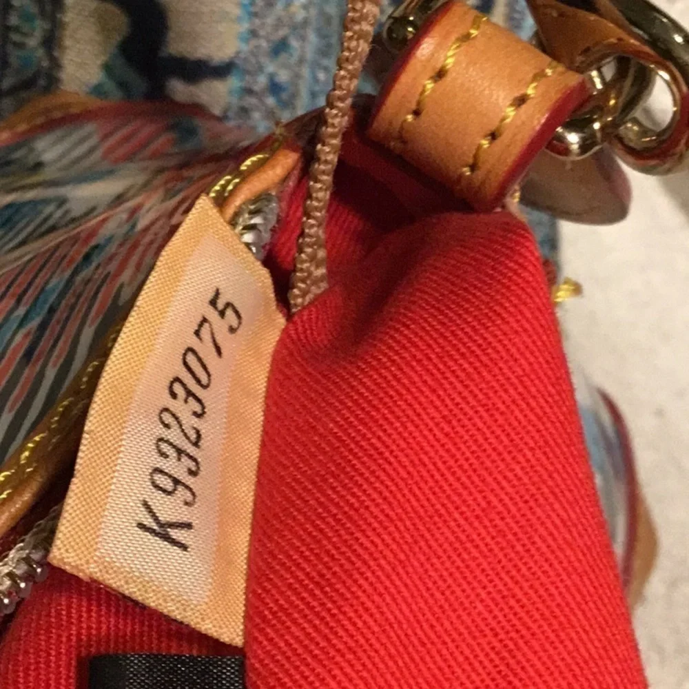 Dooney & Bourke satchel adjustable